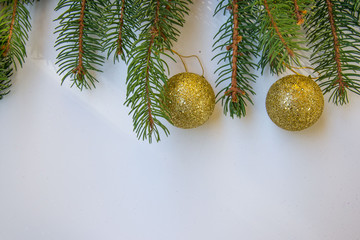 Decorative frame with place for text on white background, greeting cards made from tinsel and christmas balls, Christmas and New Year concept, copy space, top view, flat lay