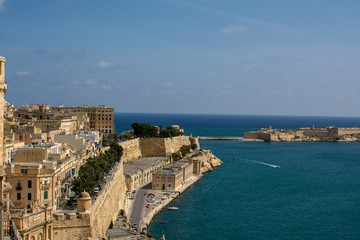 Fototapeta na wymiar View at bay entrance between Valletta and three cities in Malta