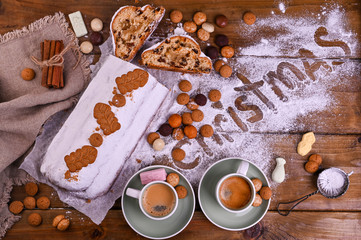 A traditional Dutch holiday for children of Sinterklaas. Winter holidays in Europe and the Netherlands. Stollen with cranberries and icing sugar. A form for writing text and aromatic coffee.