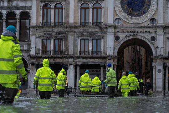 VENICE, ITALY - November 24, 2019: St. Marks Square (Piazza San Marco) during flood (acqua alta) in Venice, Italy. Venice high water. Natural disaster