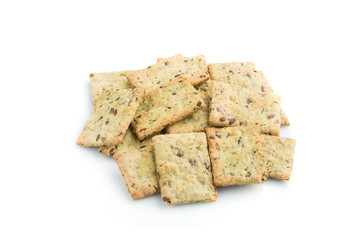 Small bread chips cookies with seeds isolated on white background. side view