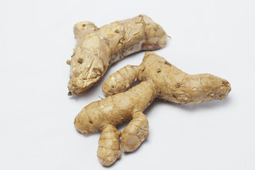 turmeric root on white background