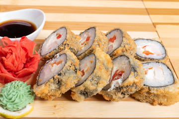 Baked salmon rolls. With ginger and wasabi