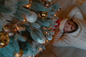 Christmas time wallpaper picture festive decorated tree garland light and toys with unfocused...