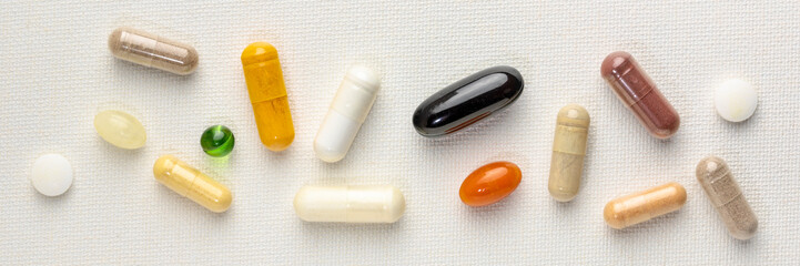 vitamins and supplements background - obrazy, fototapety, plakaty