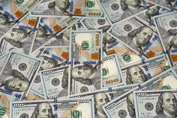Pile of new design US dollar bills as background. Top view point