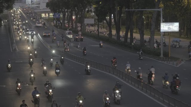 Stock 4k: Traffic in Ho Chi Minh City or Saigon, Vietnam. High-quality free stock video footage of slow moving traffic with lots of motorbike, bus, motorcycles, car... transport on the road in night