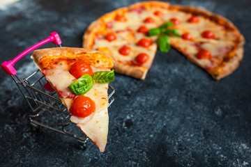 slices of pizza on a dark background