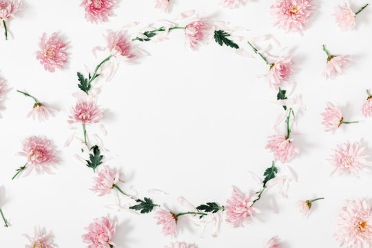 Beautiful flowers composition. Wreath made of pink flowers on  white background. Valentines Day, Easter, Happy Women's Day, Mother's day. Flat lay, top view, copy space