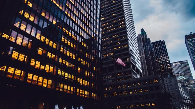 Time lapse effect of metropolitan corporate buildings in commercial financial district for business lifestyle - Manhattan, modern architecture exterior of high offices with glass windows