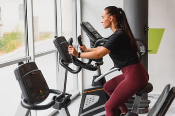 Fototapeta premium Woman was running on the treadmill in the gym