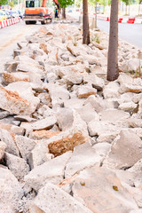 Fototapeta premium Broken asphalt and debris from some street repair work.