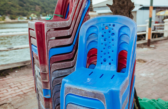 Plastic chairs on the street in summer Asia