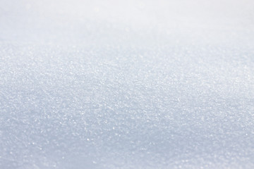 Pure white snow close-up. Blank for design. Beautiful snow background texture