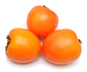 Three persimmons fruit whole isolated on a white background