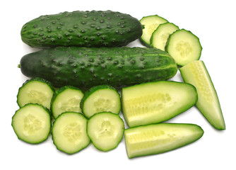 Cucumber slices isolated on white background. Top view, flat lay