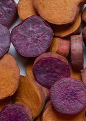 Obraz na płótnie Canvas Cooked yellow and purple sweet potatoes