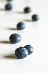 Group of fresh blueberries isolated on white background. Healthy food, health