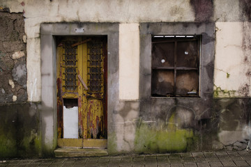Abandoned building on of one of little streets in downtown Porto, Portugal.