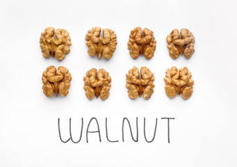 Tasty walnuts on white background