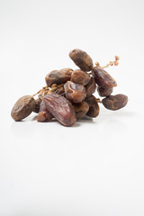 Dried date on white background