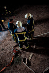 Naklejka premium Firefighting operation at night
