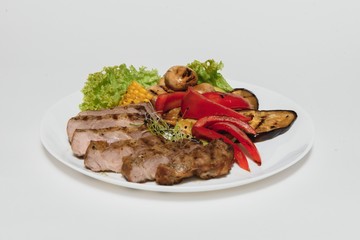 BBQ Steak. Barbecue Grilled Beef Steak Meat with Vegetables. Healthy Food. Barbeque Steak Dinner