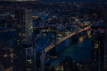 New York City aerial with skyscrapers at night