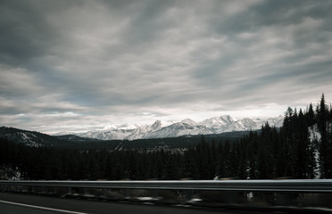 taking photos of mountains while driving
