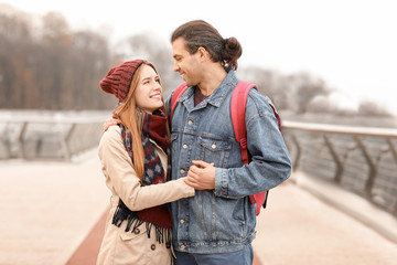 Fototapeta premium Happy couple walking on autumn day