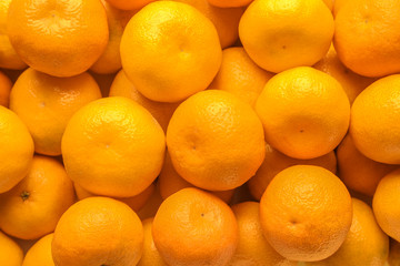 Ripe tasty tangerines as background