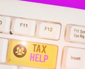 Conceptual hand writing showing Tax Help. Concept meaning Assistance from the compulsory...