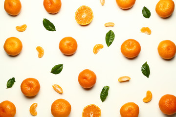 Many sweet tangerines on white background