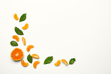 Sweet tangerines on white background
