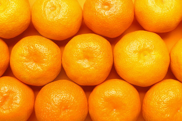 Many sweet tangerines as background