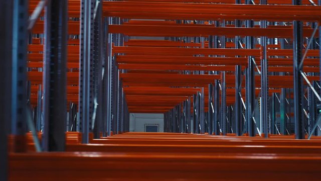 motion past metal racks assembled in storehouse closeup