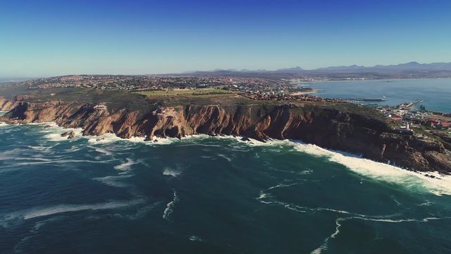 Aerial - Breathtaking panning shot of bluff at Cape St. Blaize (The Point, Mossel Bay).mov