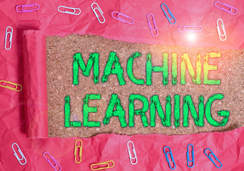 Conceptual hand writing showing Machine Learning. Concept meaning scientific study of algorithms and statistical models Paper clip and torn cardboard on wood classic table backdrop