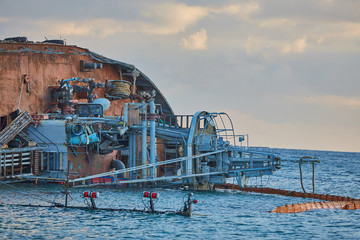sunken tanker. Tanker Bunker threw storm ashore. The tanker lies on its side. Accident with tanker
