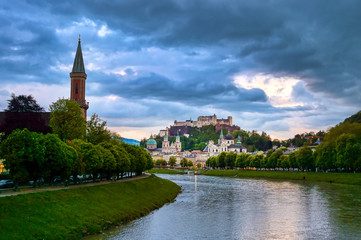 Fototapeta premium A view of the Austrian city of Salzburg along the Salzach River.