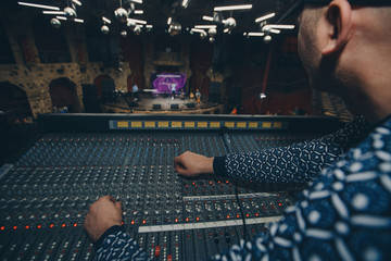 Remote recordists closeup. Electric machine on table for working of sound designer or club dj at...