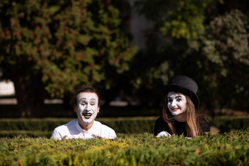 Street artists performing, Two mimes man and woman in april fools day