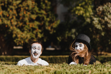 Street artists performing, Two mimes man and woman in april fools day