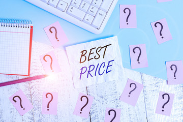 Handwriting text writing Best Price. Conceptual photo the lowest or great price that a buyer can buy something for Writing tools, computer stuff and math book sheet on top of wooden table