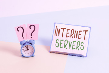 Conceptual hand writing showing Internet Servers. Concept meaning delivers the content of the page back to the user Alarm clock beside a Paper sheet placed on pastel backdrop