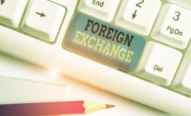 Conceptual hand writing showing Foreign Exchange. Concept meaning system for dealing in the...