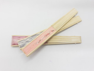 Artistic Colorful Ethnic Traditional Modern Design Hand Fan from Wood and Fabric Materials in White Isolated Background