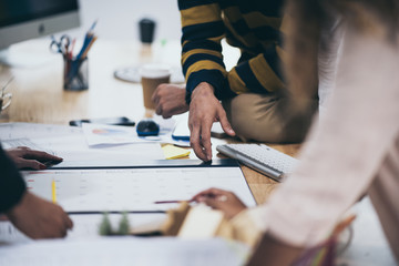 Young businessmen are presenting business plans to managers and teams.
