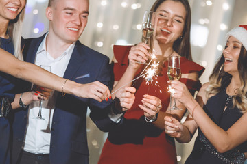 Young people celebrating Christmas in club