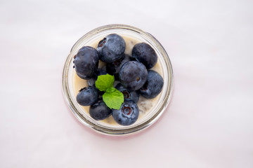 Chia pudding and banana smoothie with blueberries